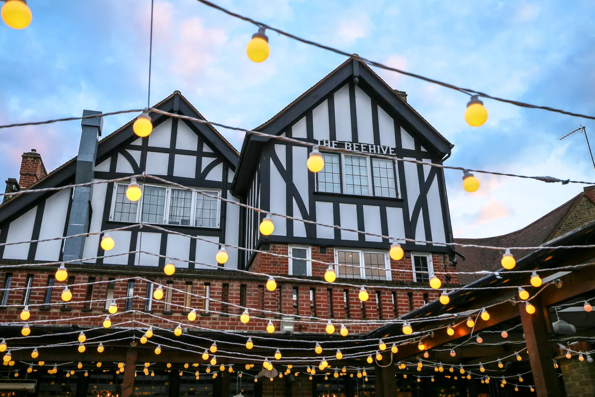 Exterior and beer garden of The Beehive pub in Tottenham, London